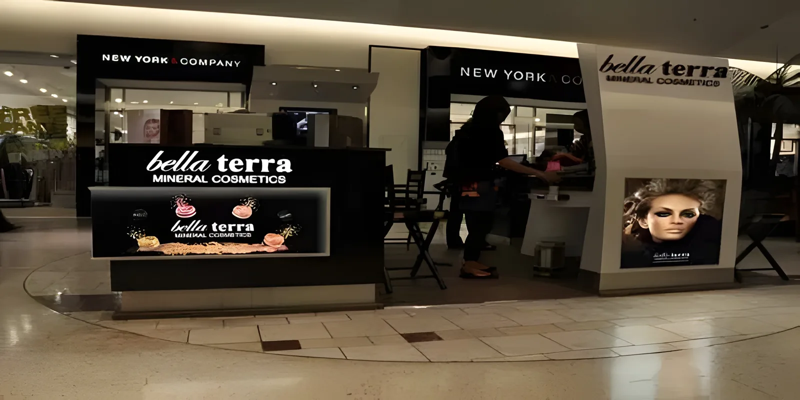 A BELLATERRA mineral cosmetics kiosk in a shopping mall
