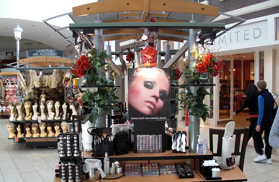 BELLATERRA kiosk with red roses and the brand poster in a shopping mall, 2008