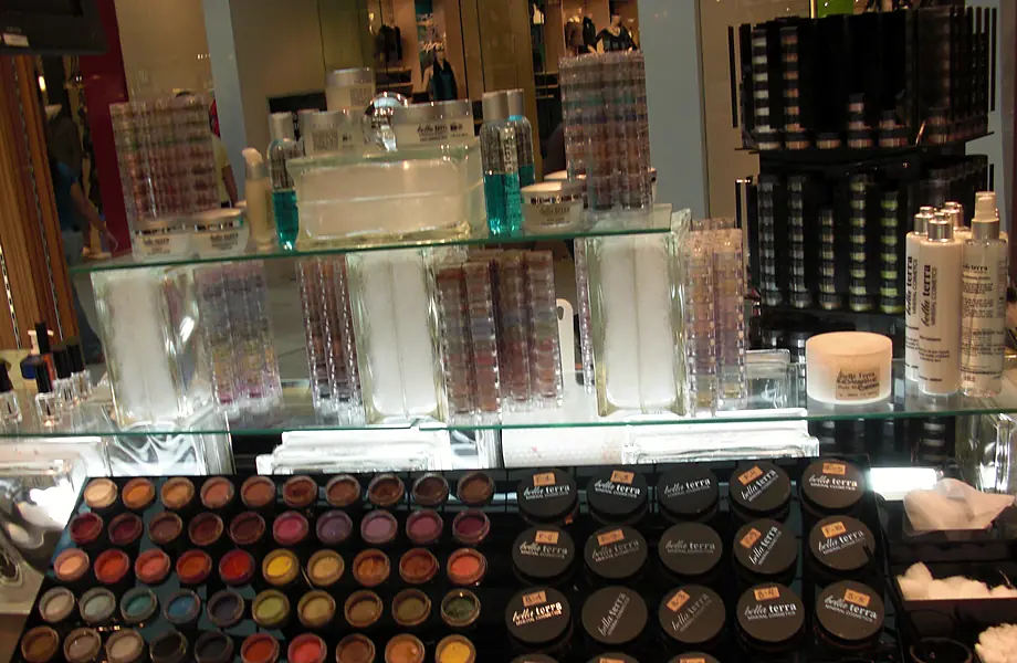 Rows of BELLATERRA loose mineral shades at a kiosk, 2008